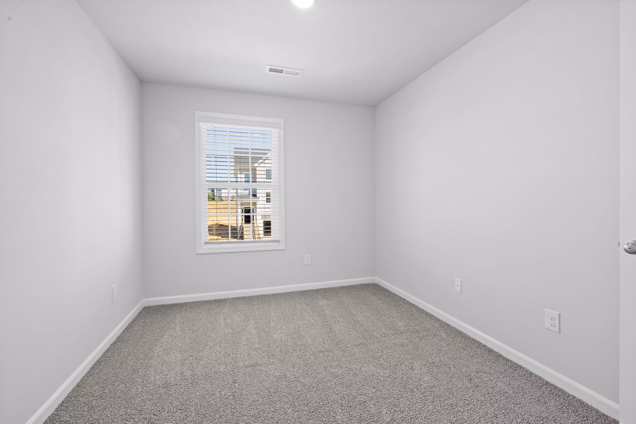 bedroom at Spire at Darrowby Ridge Apartments