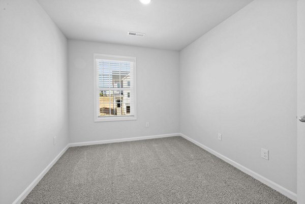 bedroom at Spire at Darrowby Ridge Apartments
