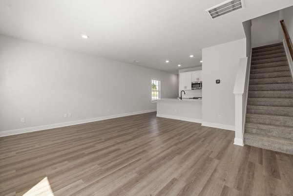 living room at Spire at Darrowby Ridge Apartments