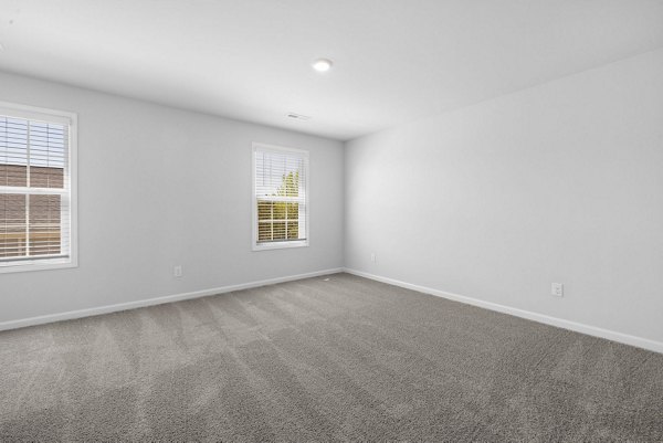living room at Spire at Darrowby Ridge Apartments