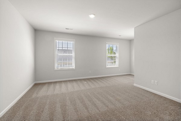 living room at Spire at Darrowby Ridge Apartments