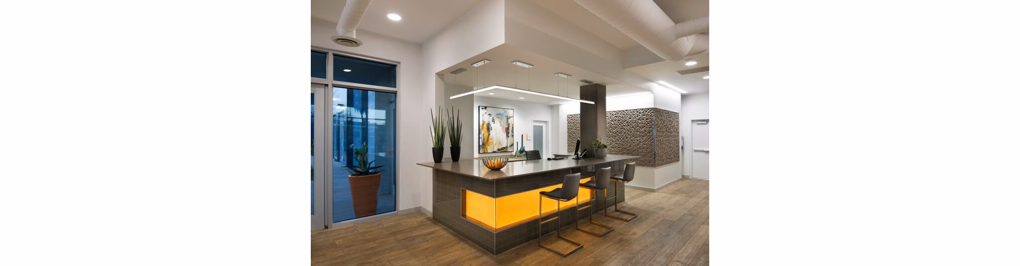 Welcoming clubhouse and lobby with modern decor at Nexa Apartments, offering a luxurious space for residents to gather and unwind