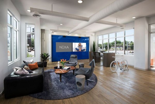 Elegant clubhouse lobby with modern furnishings at Nexa Apartments