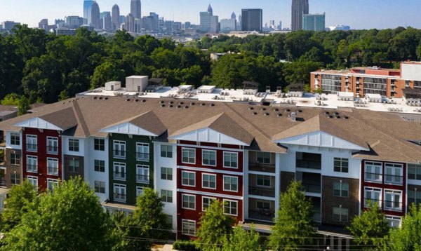 Stunning rooftop view at Ardmore & 28th Apartments, featuring lush landscaping and city skyline