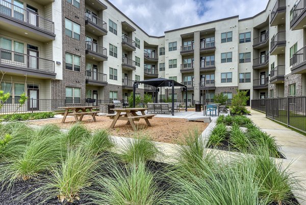 grill area at The Savoy Apartments Apartments
