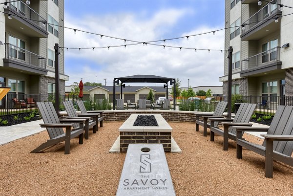 grill area at The Savoy Apartments Apartments