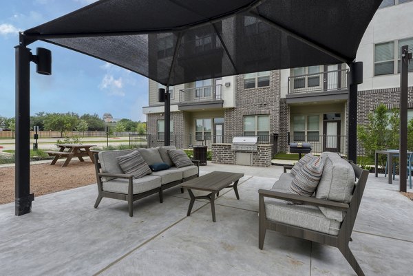 grill area at The Savoy Apartments Apartments