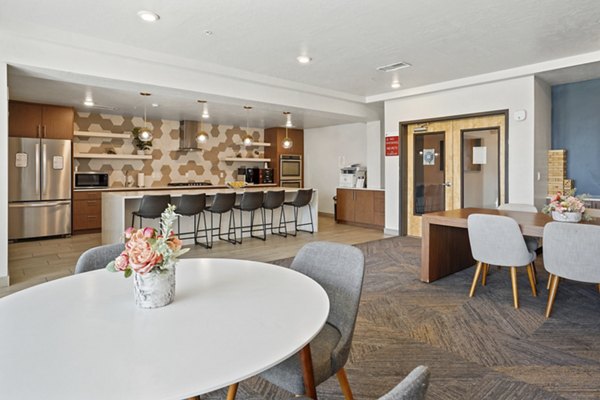 Dining room with modern decor at Milagro Apartments