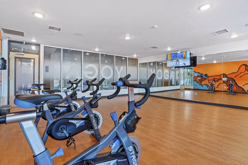 State-of-the-art fitness center with modern equipment at Milagro Apartments