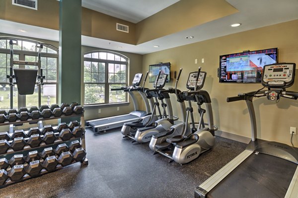 Fitness center with modern equipment at Cedar Flats Apartments