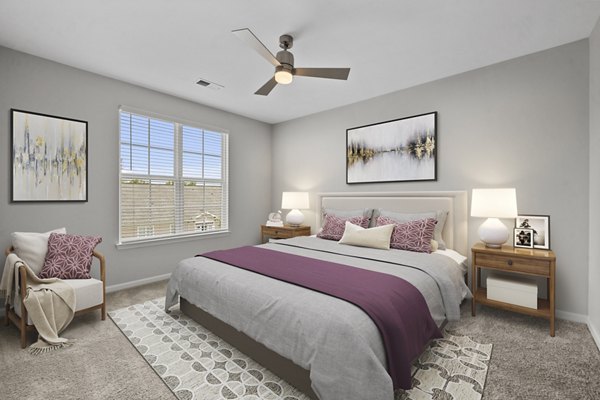 Bedroom featuring elegant design and modern furnishings at Magnolia Heights Apartments, a Greystar luxury living community