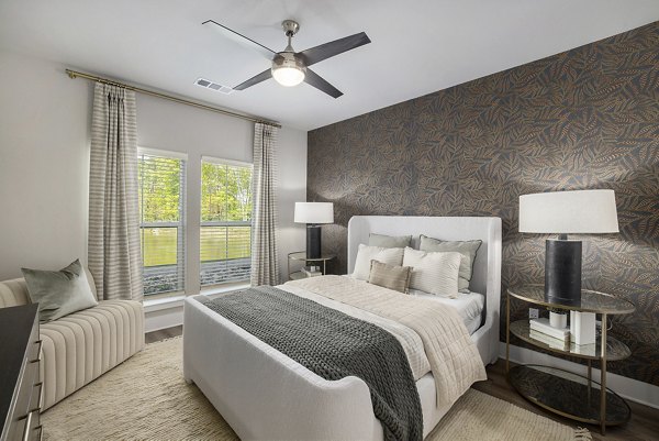 Spacious bedroom with modern decor at Satori West Ashley Apartments