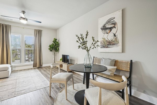 Elegant clubhouse featuring modern decor and cozy seating at Satori West Ashley Apartments