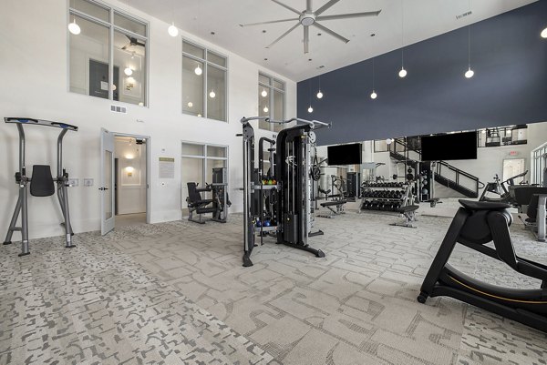 State-of-the-art fitness center with modern equipment at Satori West Ashley Apartments, ideal for active lifestyles and wellness-focused residents