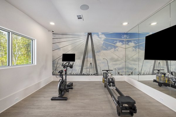 Modern fitness center with state-of-the-art equipment at Satori West Ashley Apartments