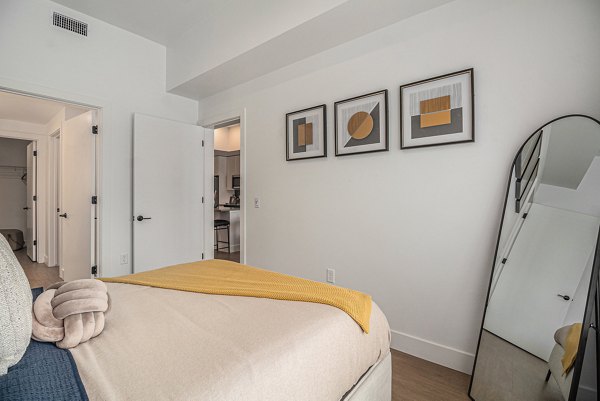 bedroom at The Riv Apartments