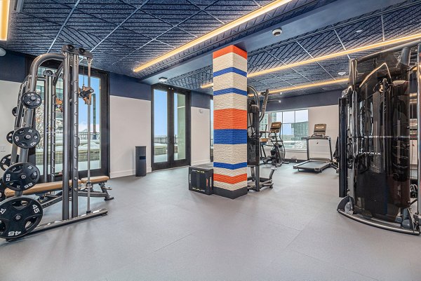 fitness center at The Riv Apartments