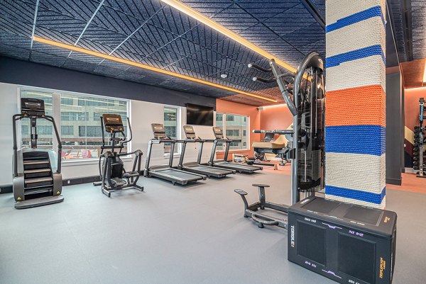 fitness center at The Riv Apartments