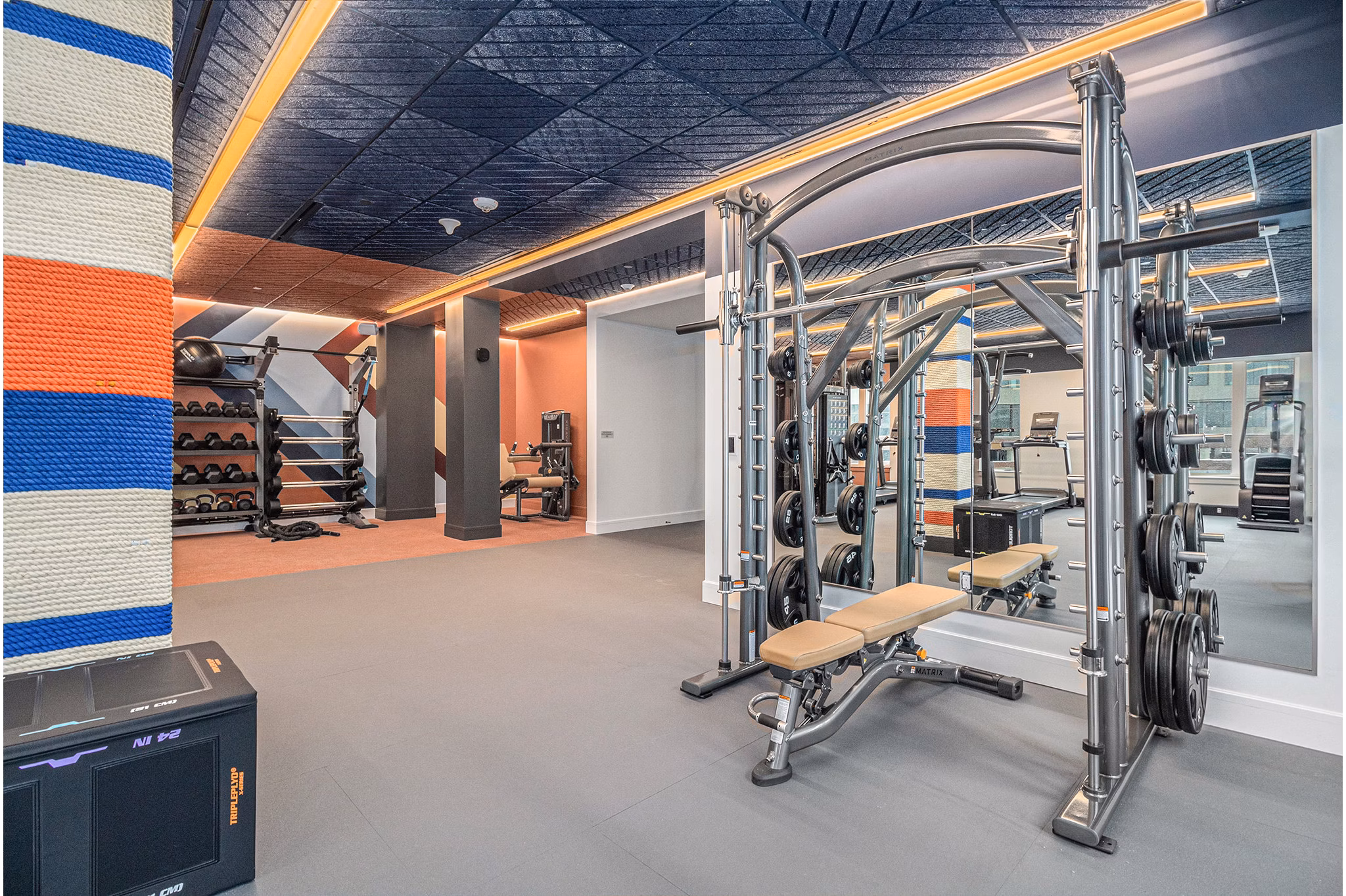 fitness center at The Riv Apartments