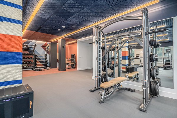 fitness center at The Riv Apartments