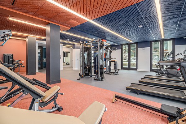 fitness center at The Riv Apartments