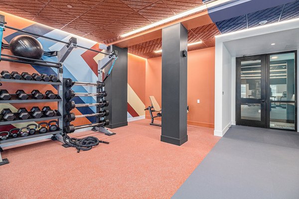 fitness center at The Riv Apartments