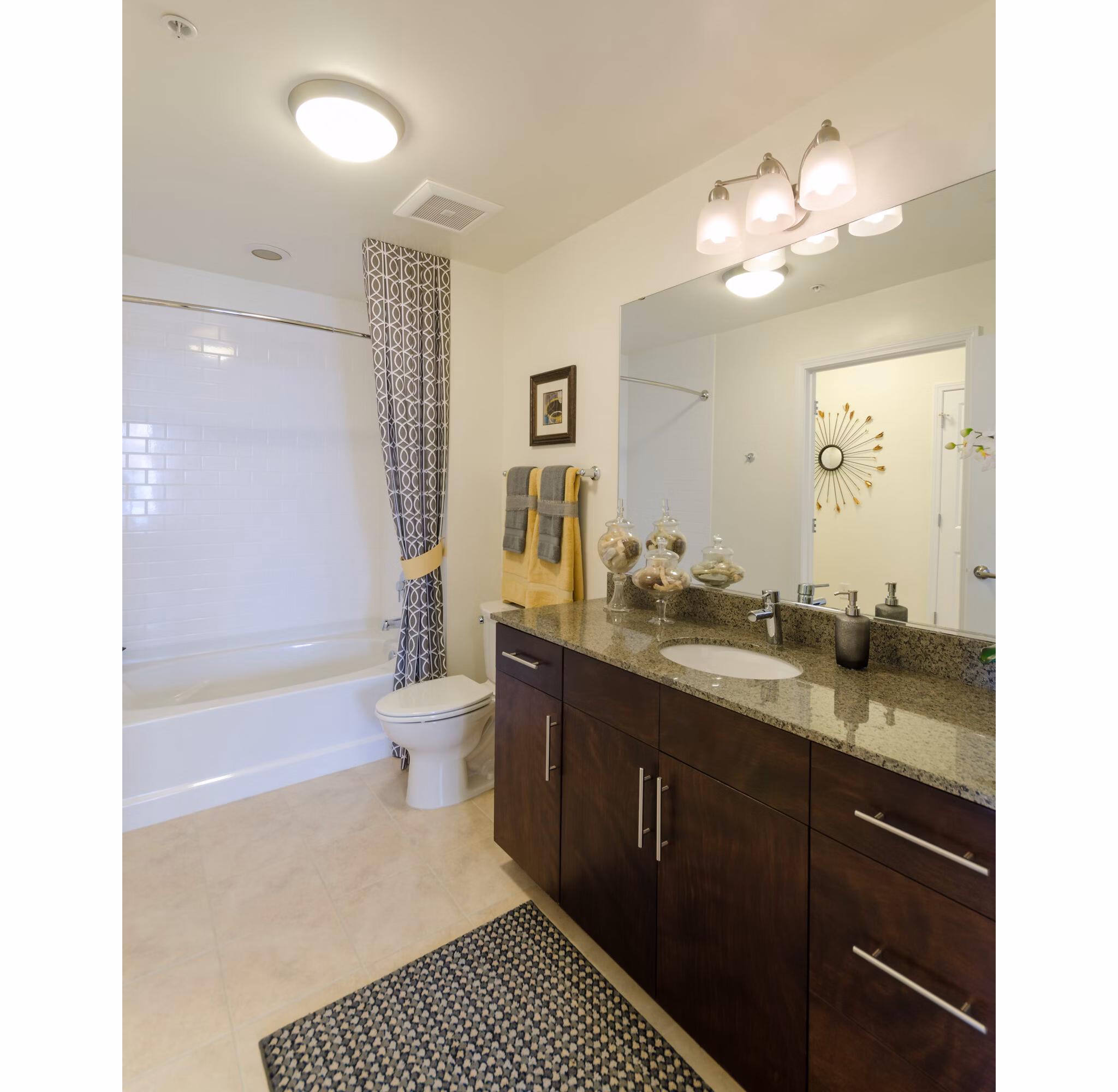 Modern bathroom with sleek fixtures at The Victor Stonebridge Apartments
