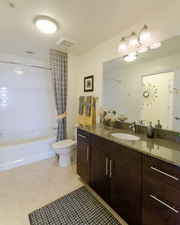 Modern bathroom with sleek fixtures at The Victor Stonebridge Apartments