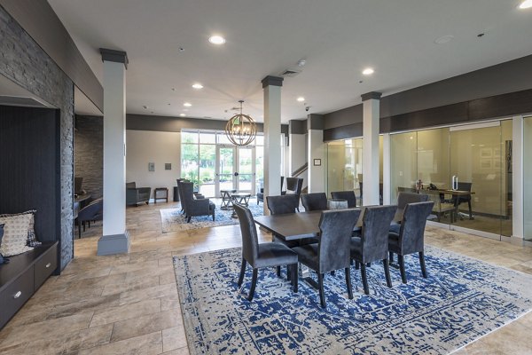 The Victor Stonebridge Apartments: Elegant clubhouse with contemporary design and cozy seating areas