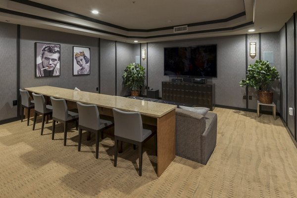 Clubhouse featuring modern seating and entertainment area at The Victor Stonebridge Apartments