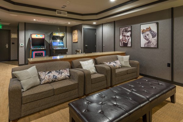 Clubhouse lounge with modern seating and decor at The Victor Stonebridge Apartments, perfect for relaxation and socializing