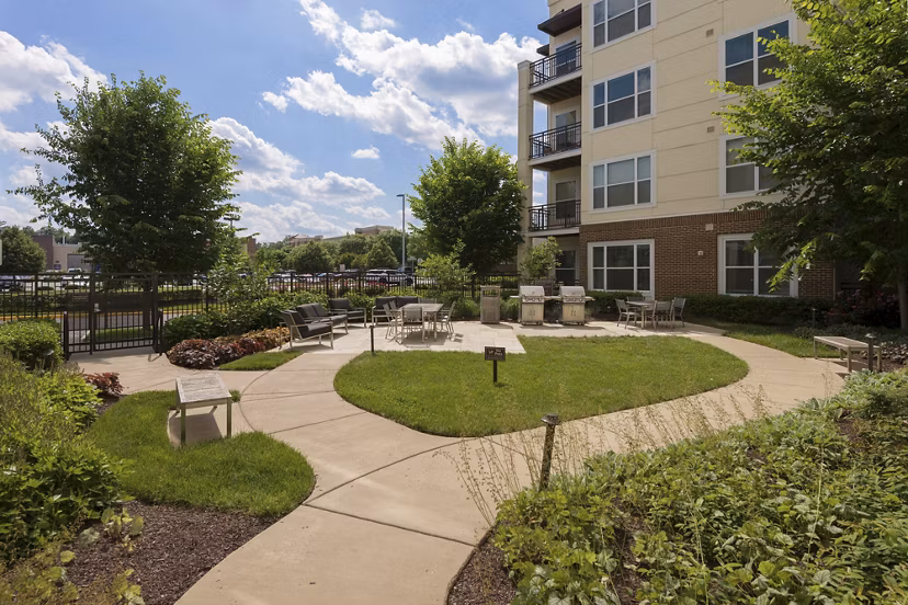 Grill area with stainless steel grills at The Victor Stonebridge Apartments