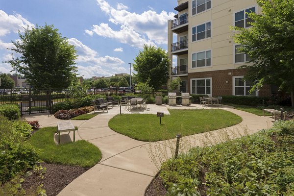 Grill area with stainless steel grills at The Victor Stonebridge Apartments