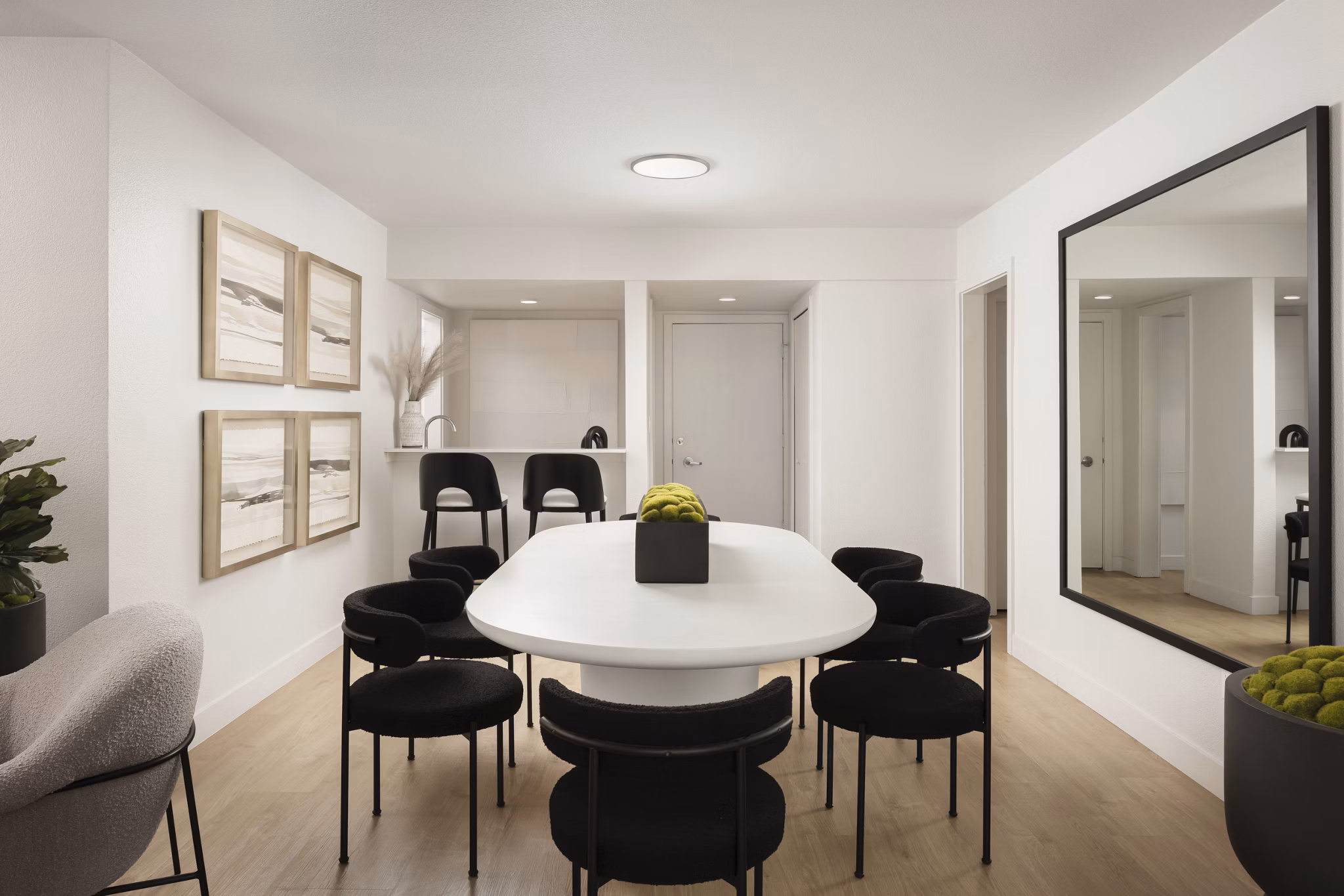 Stylish clubhouse with modern seating and decor at Dolphin Marina Apartments, offering luxury living spaces near the waterfront