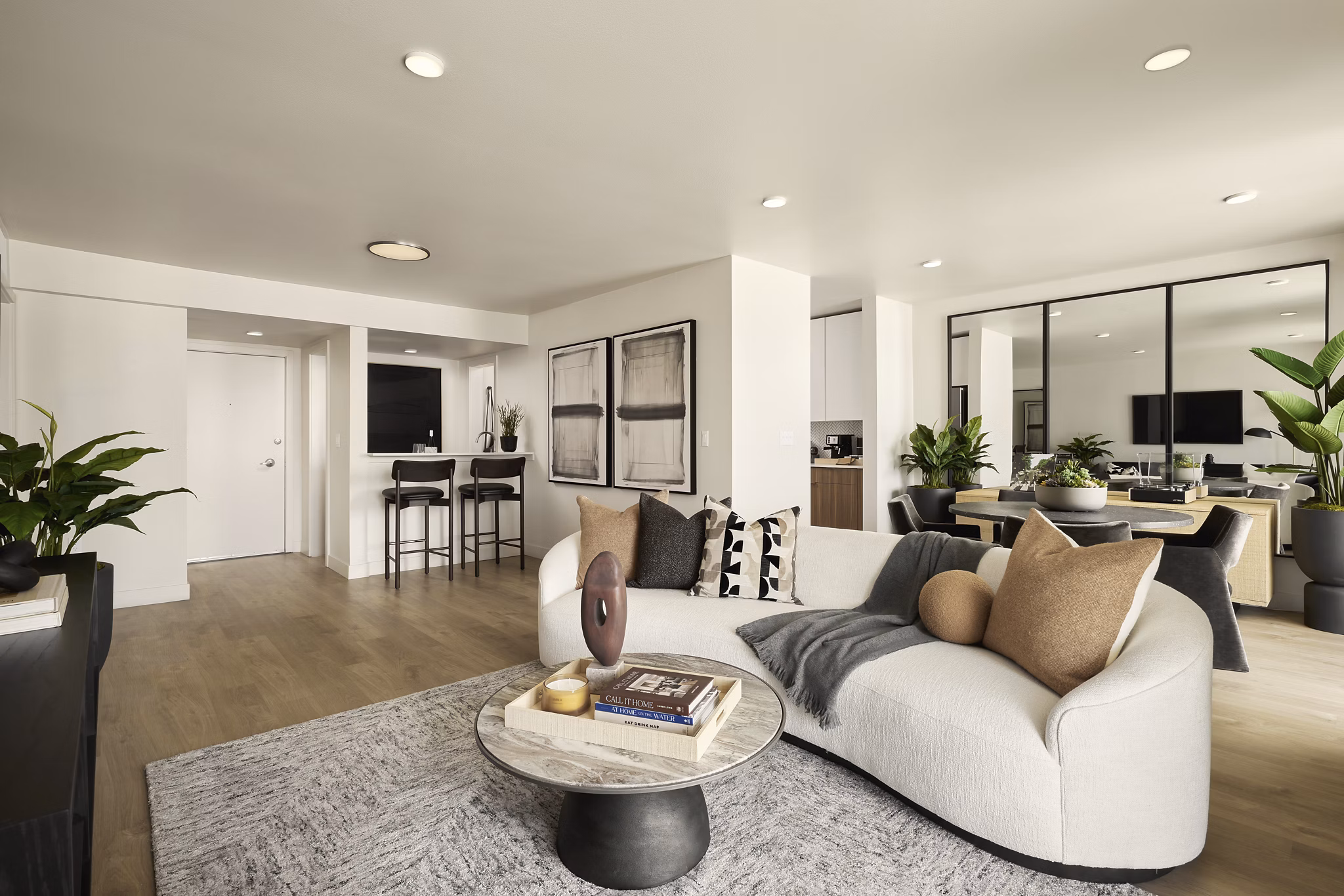 Clubhouse at Dolphin Marina Apartments: Modern lounge area with plush seating and stylish decor in vibrant coastal setting