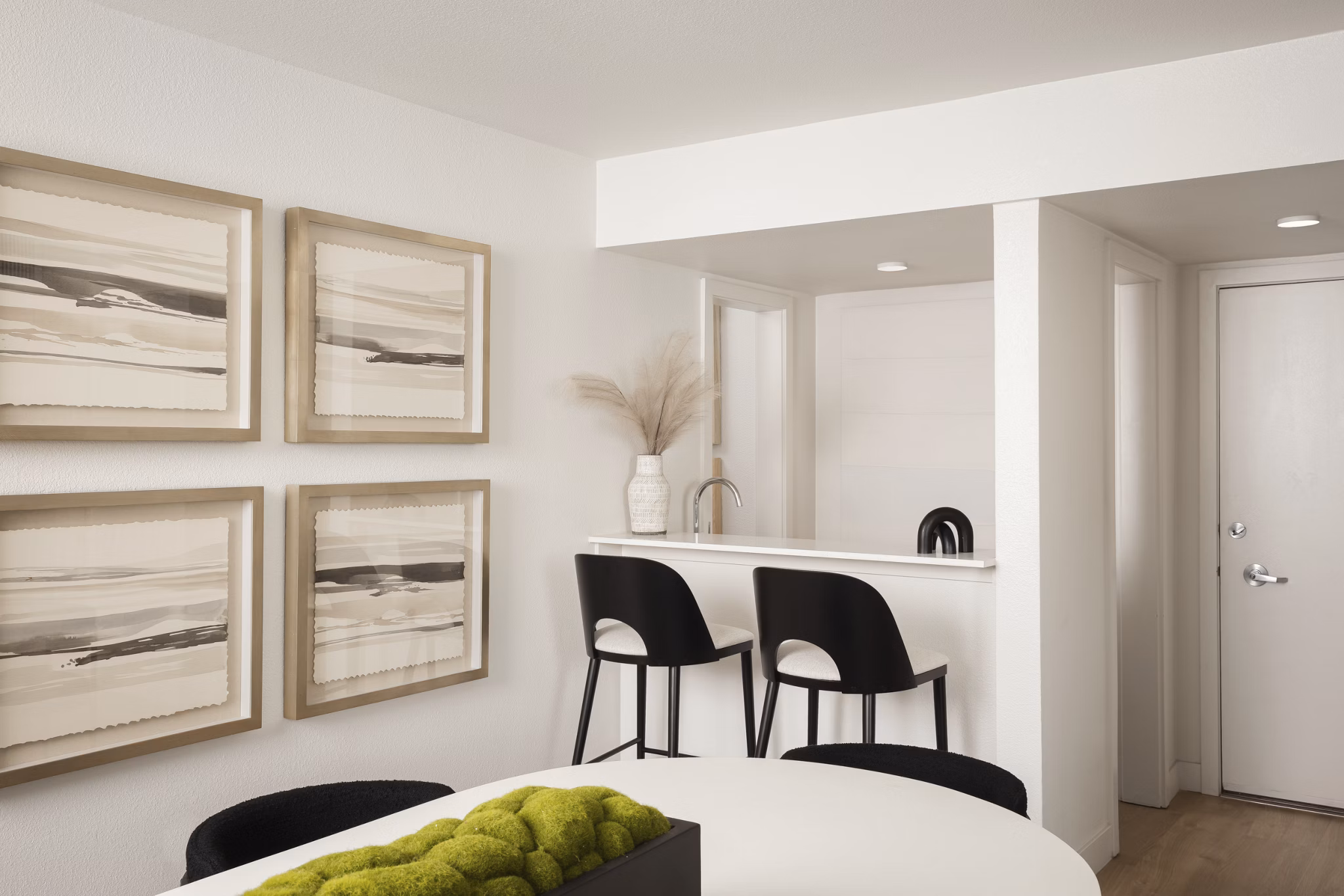 Clubhouse at Dolphin Marina Apartments featuring modern furnishings and social spaces near Boston Harbor