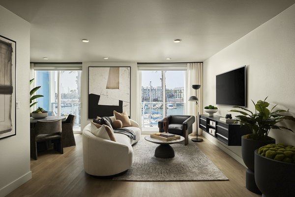 Spacious living room with modern decor at Dolphin Marina Apartments