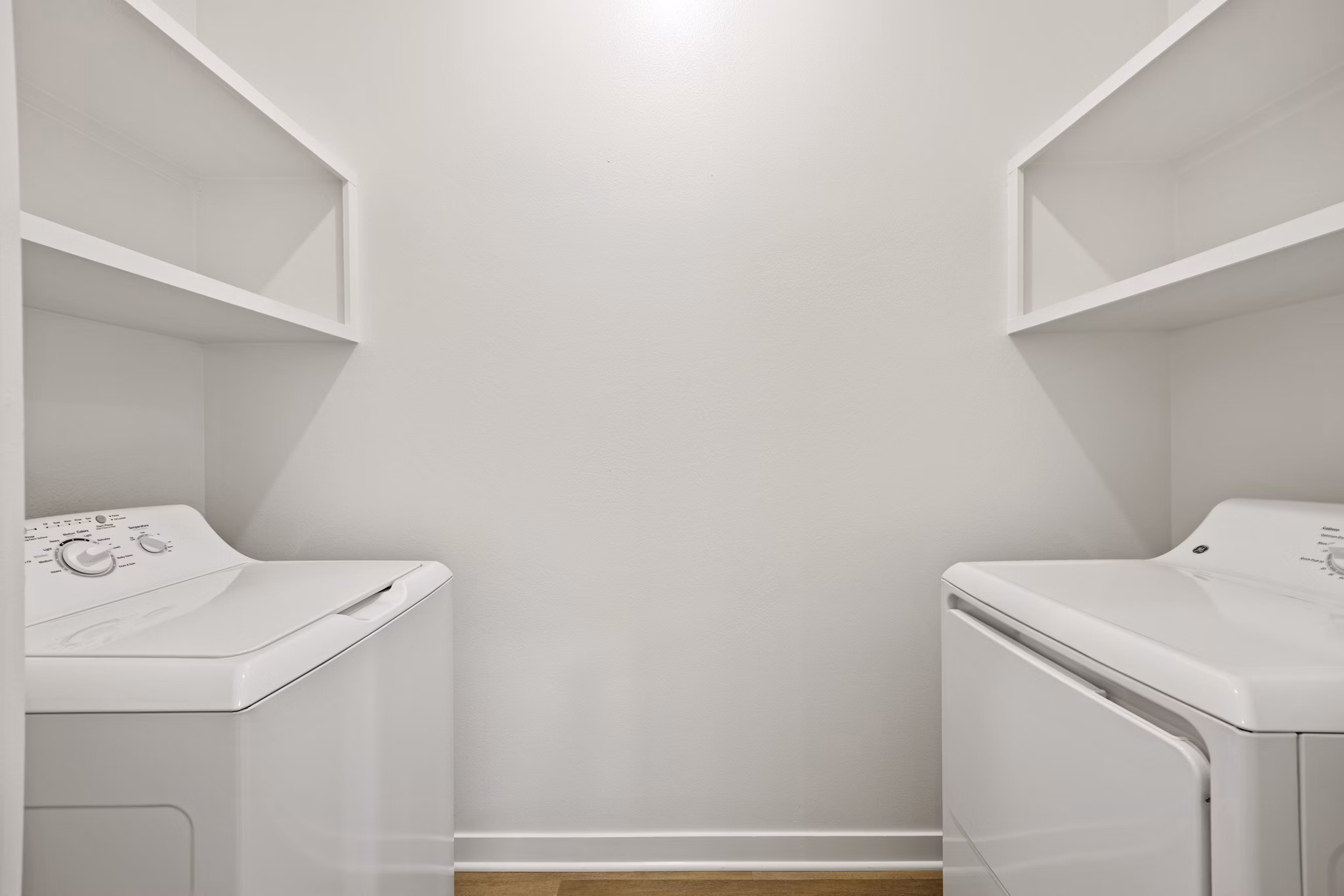 laundry room at Birchway Sherman Apartments