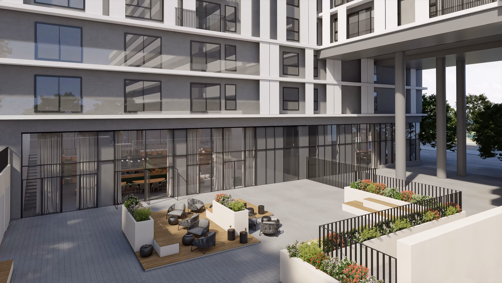 tylish outdoor patio area with comfortable seating at Nera Living Atocha.