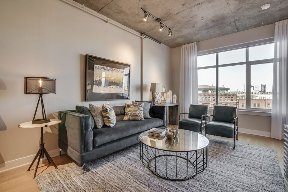 living room at The Crescent at Fells Point Apartments