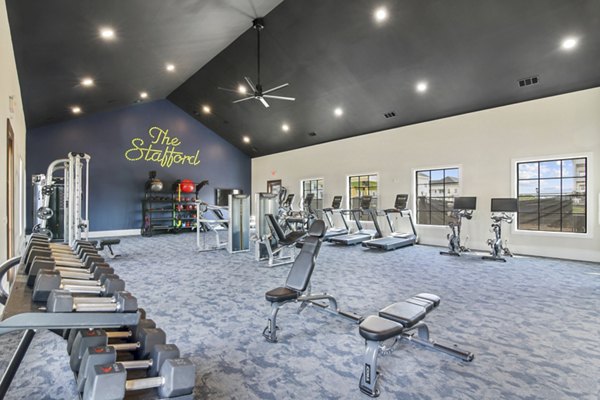 fitness center at The Stafford Apartments 