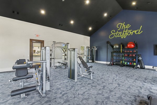 fitness center at The Stafford Apartments 