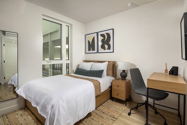 bedroom at LUCA Apartments 