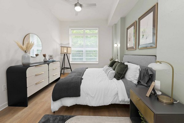 bedroom at Alexan LoSo Apartments 