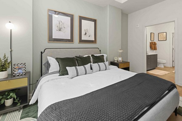 bedroom at Alexan LoSo Apartments 