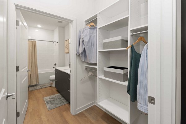 bedroom at Alexan LoSo Apartments 