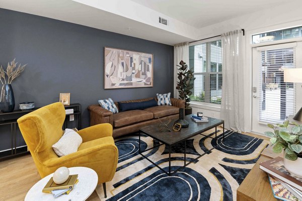 living room at Alexan LoSo Apartments 