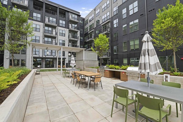 grill area at Alexan LoSo Apartments 