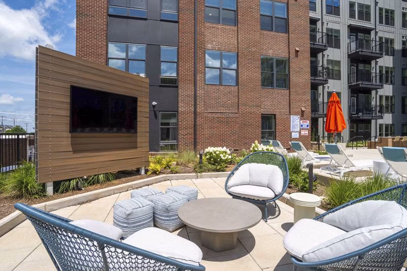 grill area/patio at Alexan LoSo Apartments