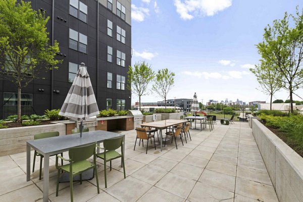 grill area at Alexan LoSo Apartments 